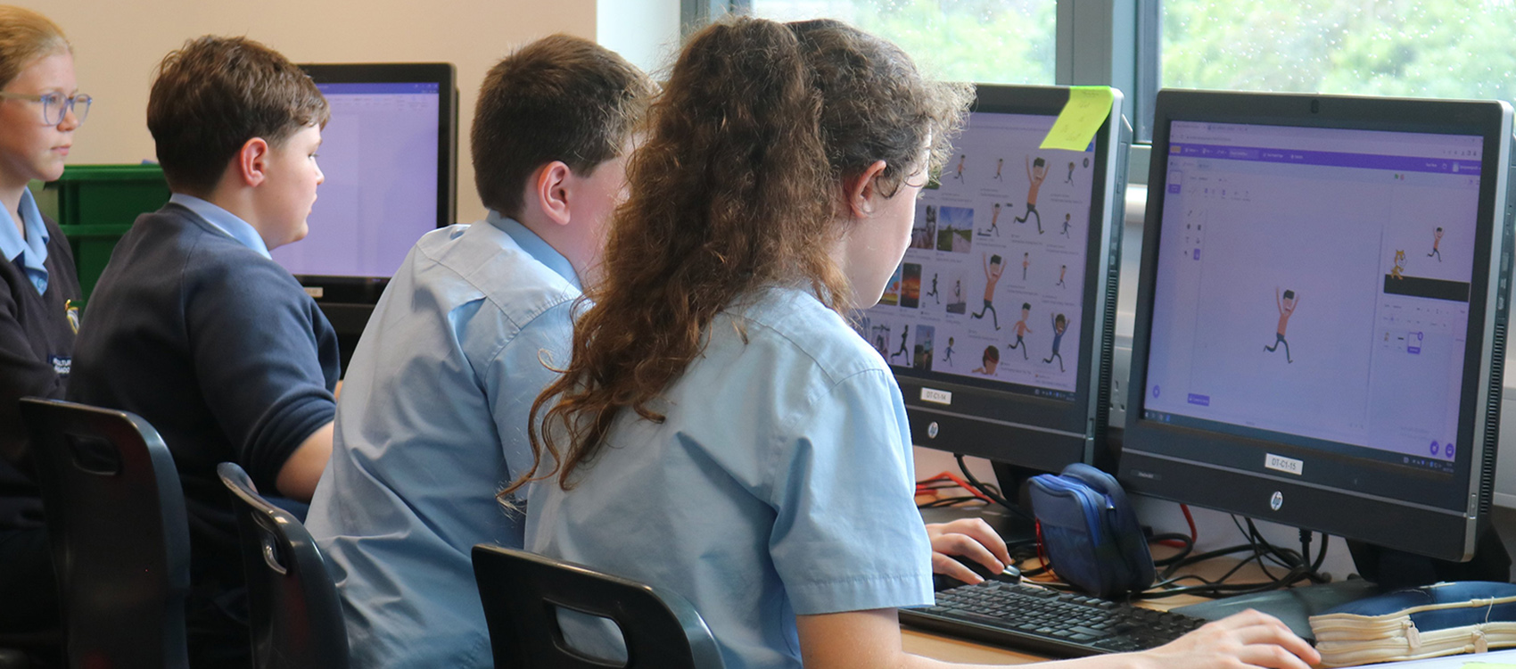 Students engaged in a Computer Science lesson using computers at Kennet School