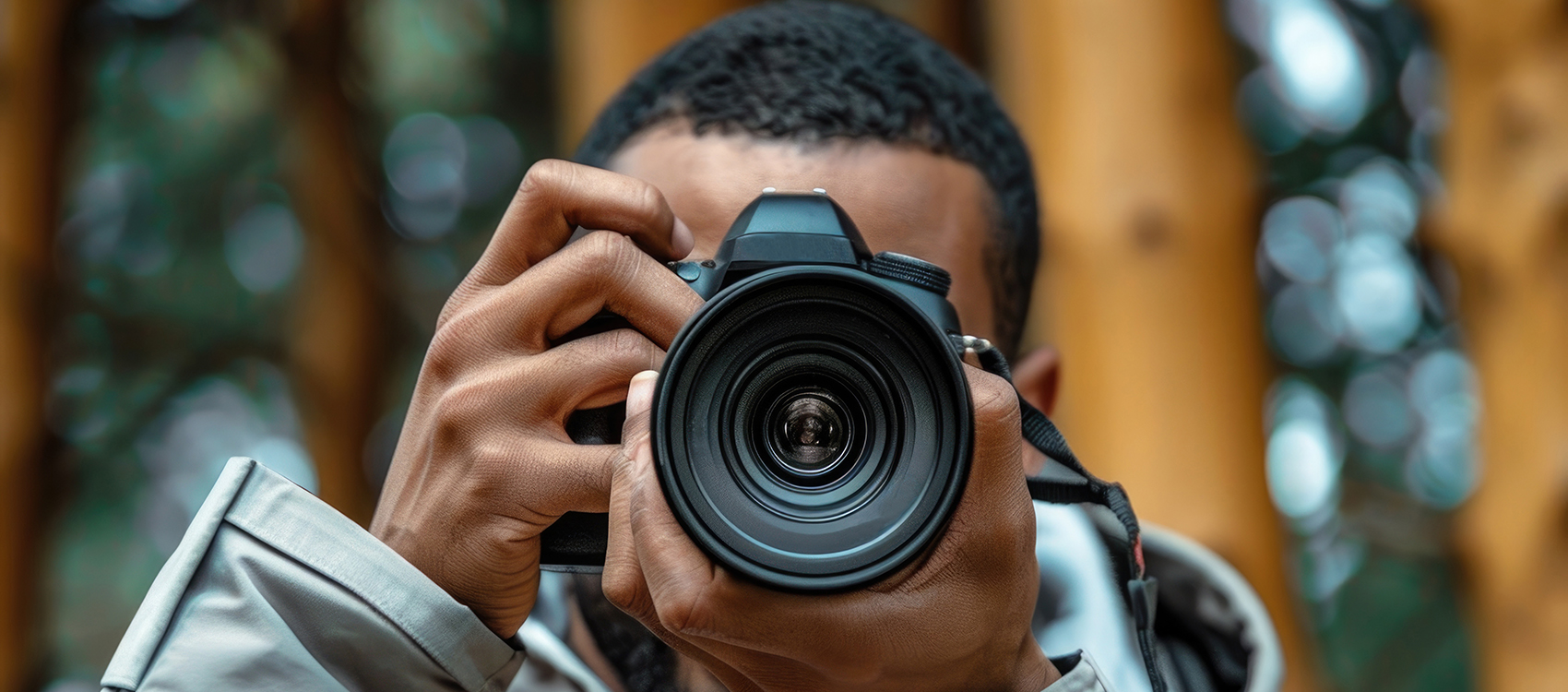 Kennet School student capturing an image using a DSLR camera on a trip