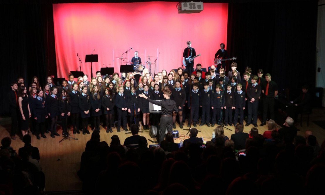 Group of pupils performing in a Choir at Kennet's House Music Event
